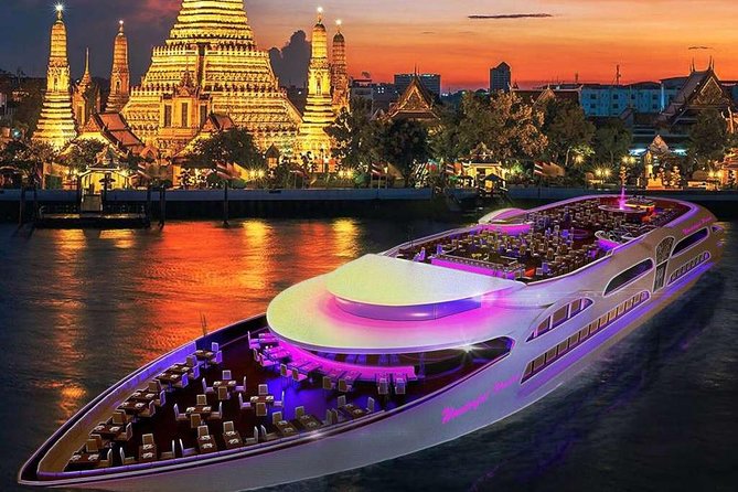 Chao Pharaya Cruise with an illuminated Wat Arun temple in the background - Thai Pass