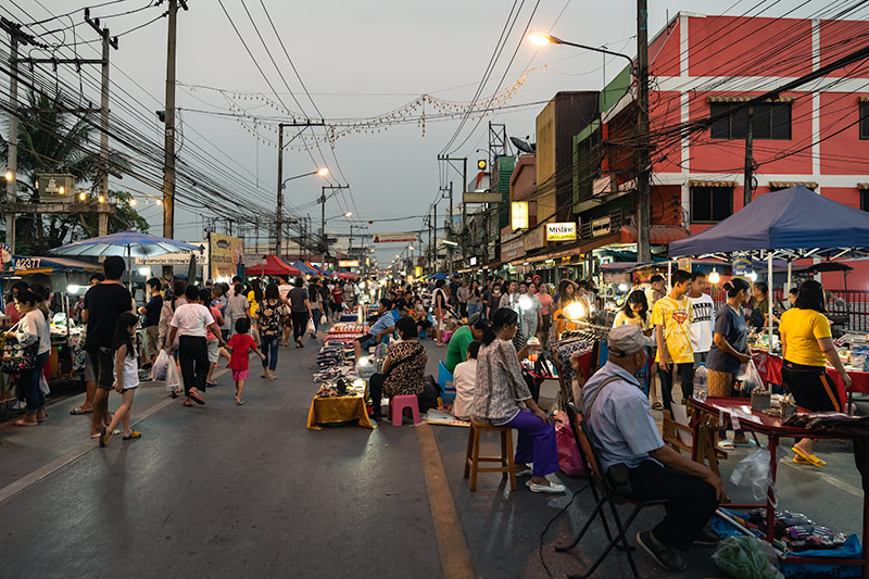 People shopping and exploring the local market in Chiang Mai - Thai Pass